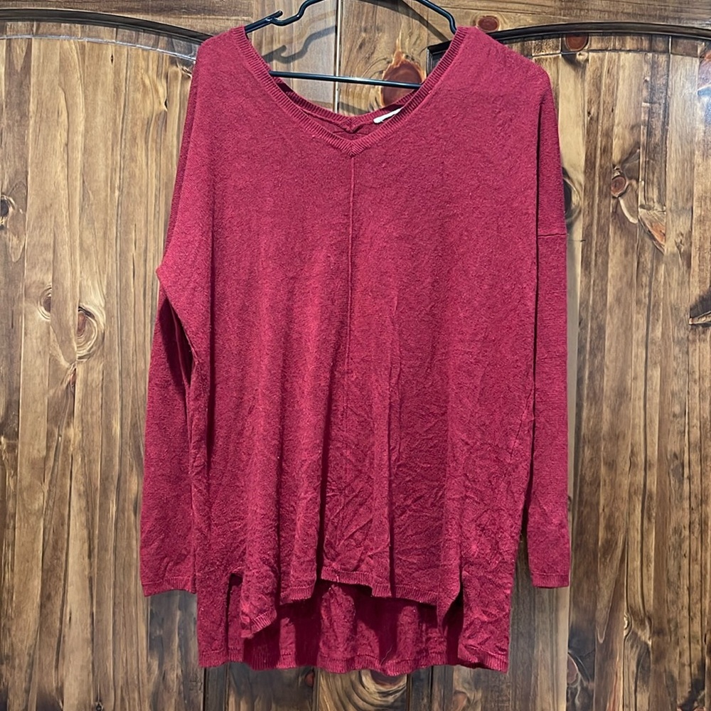 Dark red sweater